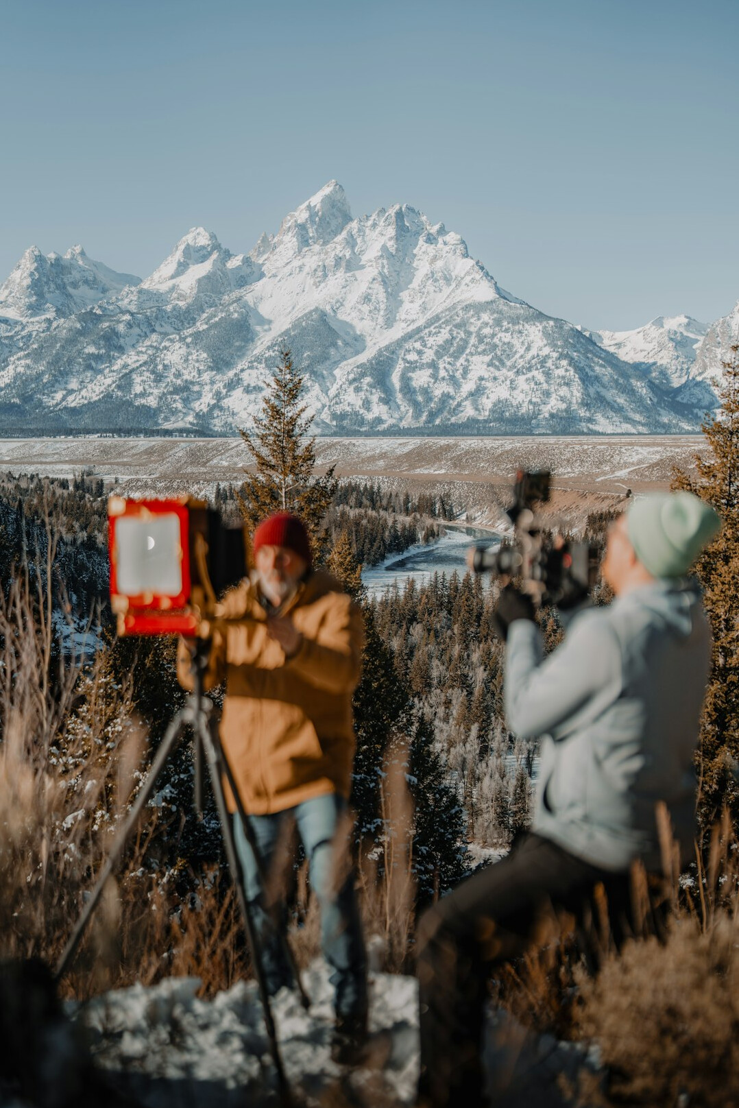 Camera crew filming an outdoor news segment